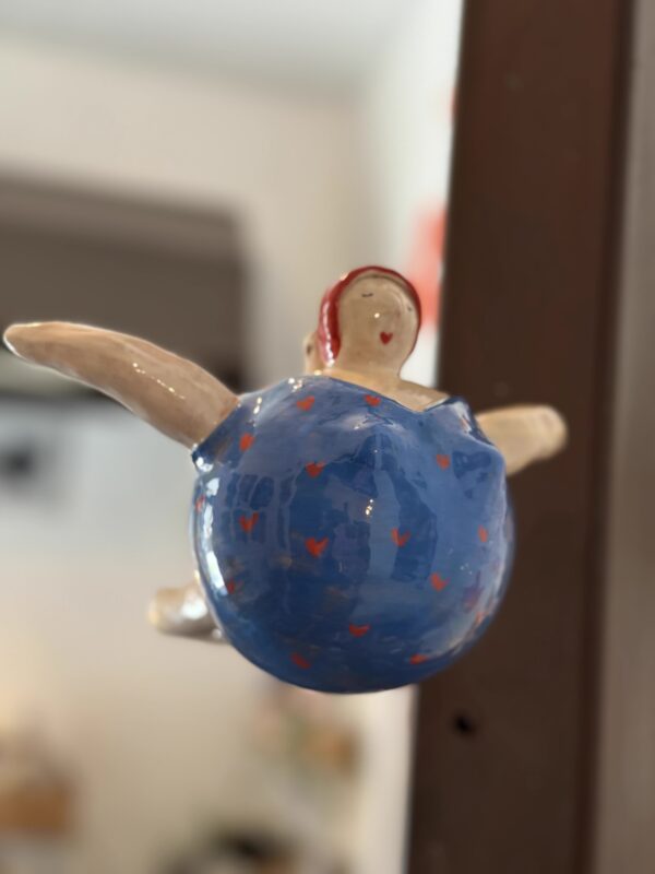 Donna Cannone volante blu - immagine 3